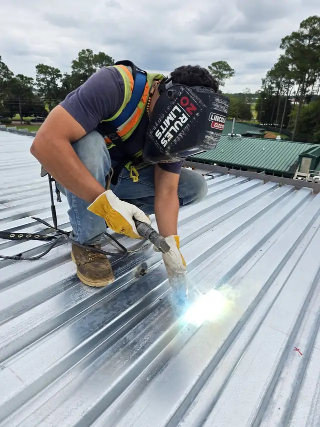 Ironworker field welding metal deck
